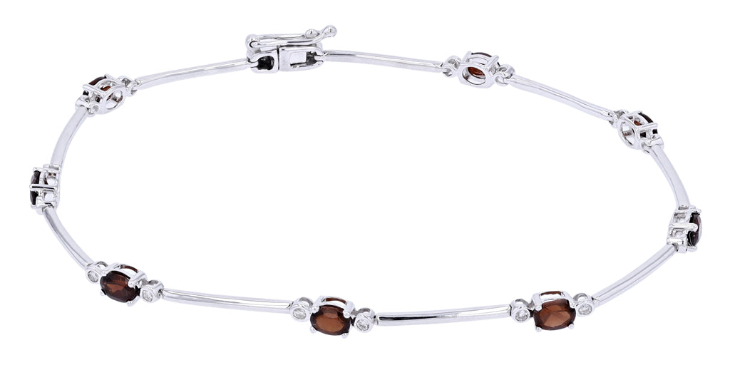 10K WG Garnet & Diamond Bracelet