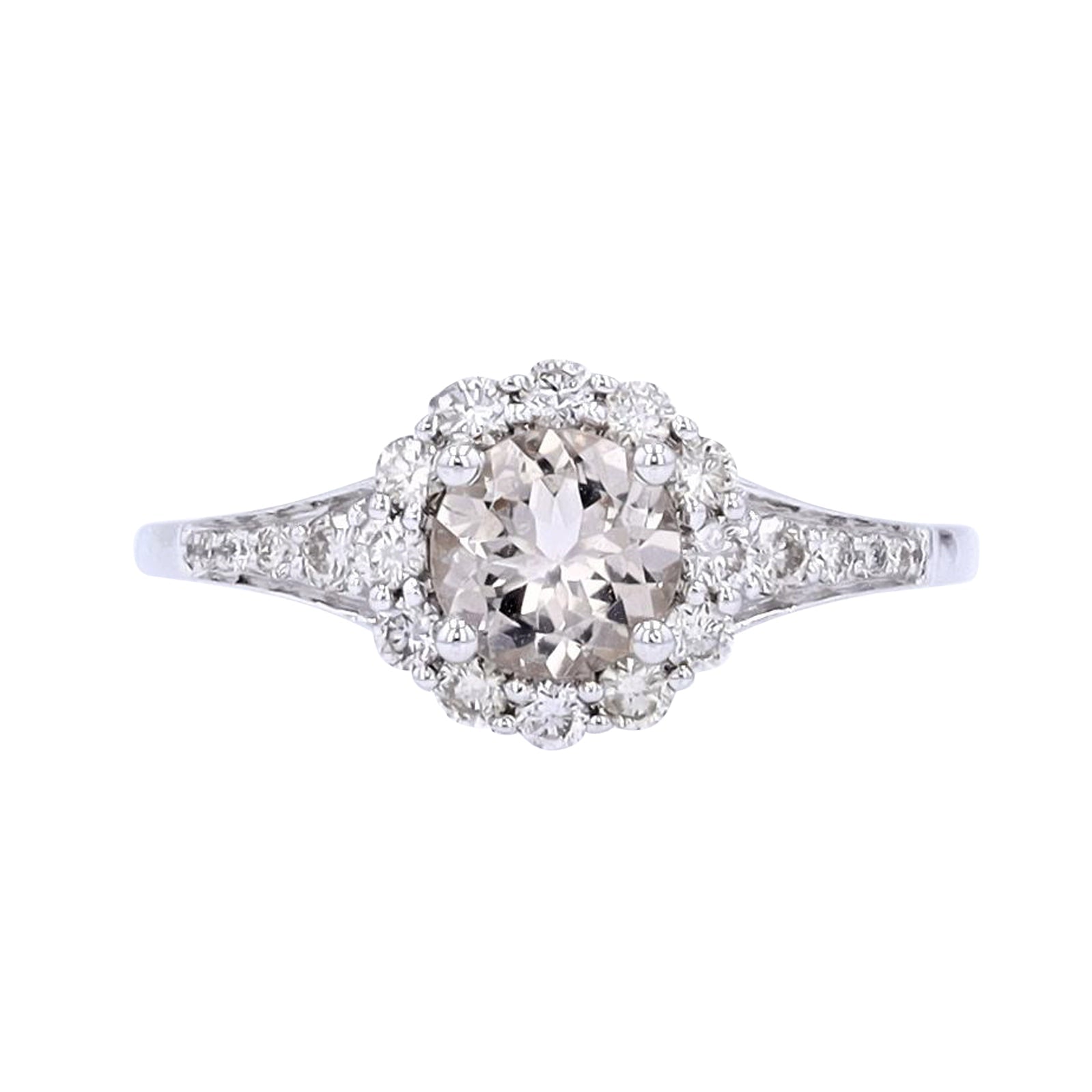 10K WG Gemstone Halo Ring<p><strong>More Colors Available</p></strong>